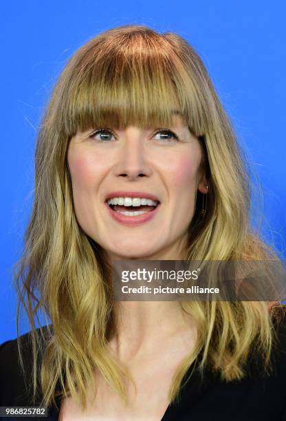 February 2018, Germany, Berlin, Berlinale, photo session, "7 Tage in Entebbe" : The actress Rosamund Pike. The film is running out of competition as...