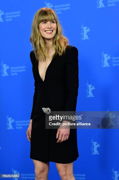 February 2018, Germany, Berlin, Berlinale, photo session, "7 Tage in Entebbe" : The actress Rosamund Pike. The film is running out of competition as...
