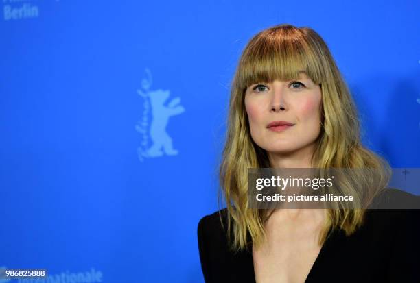 February 2018, Germany, Berlin, Berlinale, photo session, "7 Tage in Entebbe" : The actress Rosamund Pike. The film is running out of competition as...