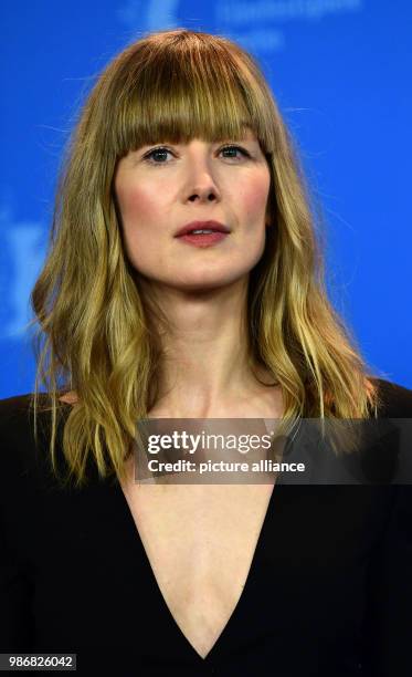 February 2018, Germany, Berlin, Berlinale, photo session, "7 Tage in Entebbe" : The actress Rosamund Pike. The film is running out of competition as...