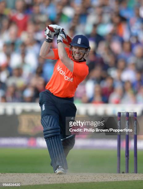 England captain Eoin Morgan hits a six during his innings of 71 runs from 31 balls in the NatWest International Twenty20 between England and India at...