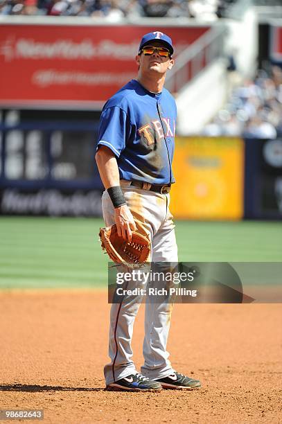 Third baseman Michael Young of the Texas Rangers stands on the field during the game against the New York Yankees at Yankee Stadium in the Bronx, New...