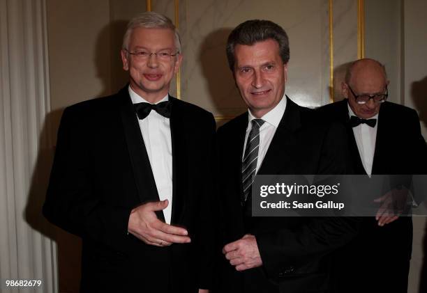 Hesse governor Roland Koch and Baden-Wuerttemberg governor Guenther Oettinger attend the Roland Berger Award for Human Dignity 2010 at the...