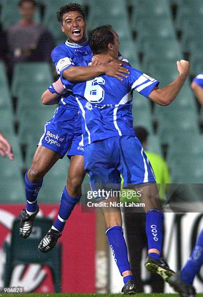 Nick Carle of Olympic congratulates teammate Ante Juric after he scored the winning goal during the NSL Minor semi-final between Sydney Olympic and...