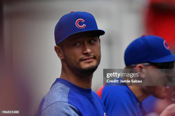 Yu Darvish of the Chicago Cubs watches from the dugout during a game against the Cincinnati Reds at Great American Ball Park on June 23, 2018 in...