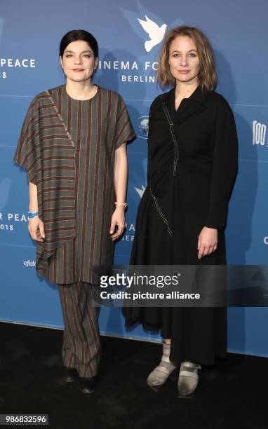 Febuary 2018, Germany, Berlin: Berlinale, Cinema for Peace in the Hotel de Rome: the actresses Jasmin Tabatabai and Julia Thurnau. The award ceremony...