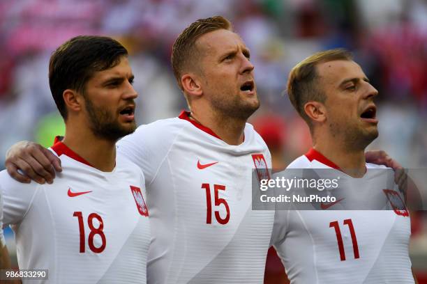 Bartosz Bereszynski, Kamil Glik and Kamil Grosicki of Poland during the 2018 FIFA World Cup Group H match between Japan and Poland at Volgograd Arena...