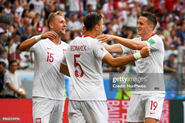 Polish players celebrate Jan Bednarek scoring during the 2018 FIFA World Cup Group H match between Japan and Poland at Volgograd Arena in Volgograd,...