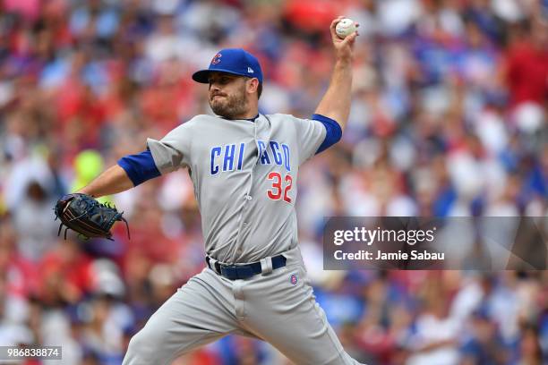 Brian Duensing of the Chicago Cubs pitches against the Cincinnati Reds at Great American Ball Park on June 23, 2018 in Cincinnati, Ohio.