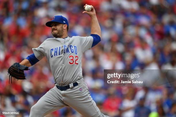 Brian Duensing of the Chicago Cubs pitches against the Cincinnati Reds at Great American Ball Park on June 23, 2018 in Cincinnati, Ohio.