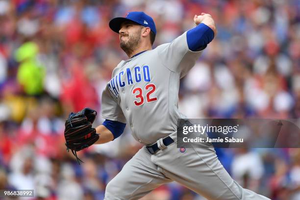 Brian Duensing of the Chicago Cubs pitches against the Cincinnati Reds at Great American Ball Park on June 23, 2018 in Cincinnati, Ohio.