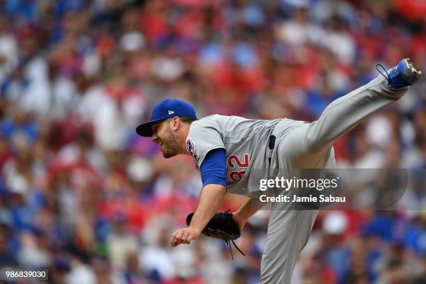 Brian Duensing of the Chicago Cubs pitches against the Cincinnati Reds at Great American Ball Park on June 23, 2018 in Cincinnati, Ohio.