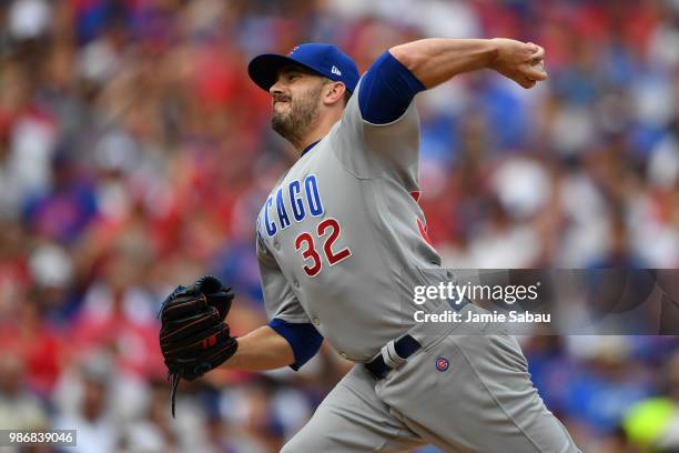 Brian Duensing of the Chicago Cubs pitches against the Cincinnati Reds at Great American Ball Park on June 23, 2018 in Cincinnati, Ohio.