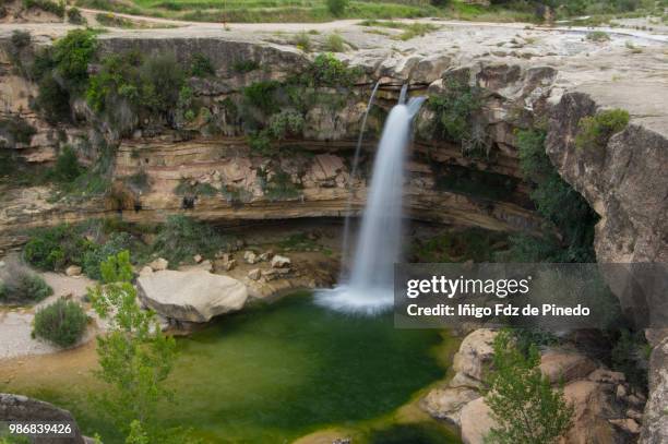 the salto de la portellada waterfall, teruel province, aragón comunity, spain. - billabong water stock pictures, royalty-free photos & images