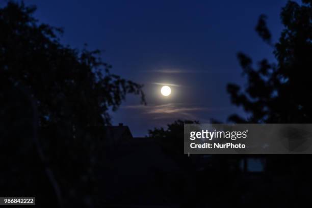 Strawberry moon, full moon of June over Schleckheim in Aachen on June 28, 2018