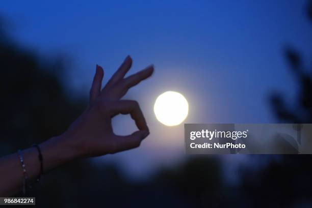 Strawberry moon, full moon of June over Schleckheim in Aachen on June 28, 2018