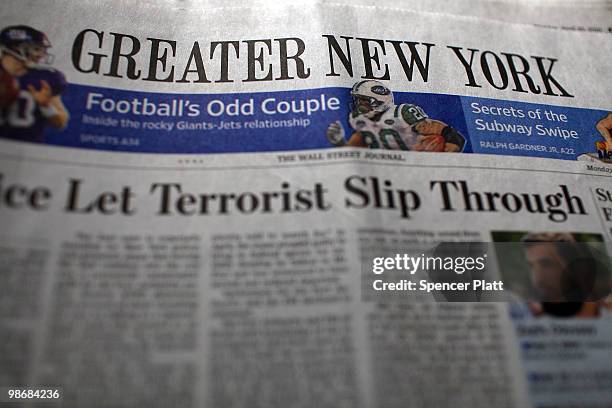 The Greater New York section of The Wall Street Journal is seen on April 26, 2010 in New York, New York. The Wall Street Journal commenced a New York...