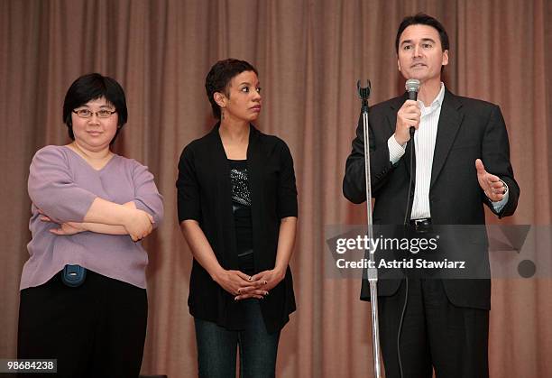 Phyllis Tam and Middle School 131 Dance Teacher Margaret Plaza watch senior director of external relations at OfficeMax Bill Bonner during the...