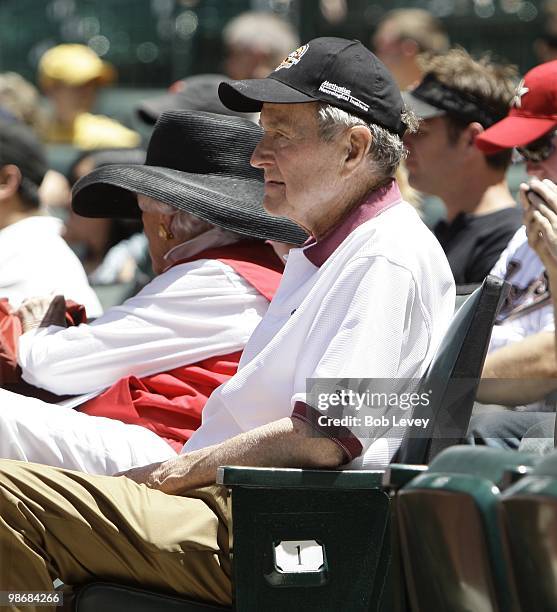 Former President George H.W. Bush and Barbara Bush attend a baseball game between the Pittsburgh Pirates and the Houston Astros at Minute Maid Park...