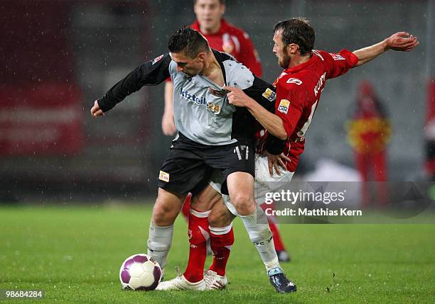 Marco Kurth of Cottbus battles for the ball with Torsten Mattuschka of Berlin during the Second Bundesliga match between FC Energie Cottbus and 1.FC...
