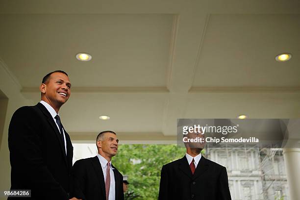 World Series champion New York Yankees players Alex Rodriguez and Derek Jeter stand with team manager Joe Girardi outside the West Wing of the White...