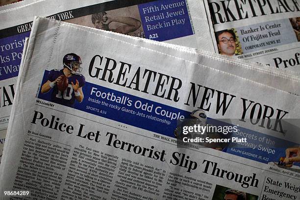 The Greater New York section of The Wall Street Journal is seen on April 26, 2010 in New York, New York. The Wall Street Journal commenced a New York...