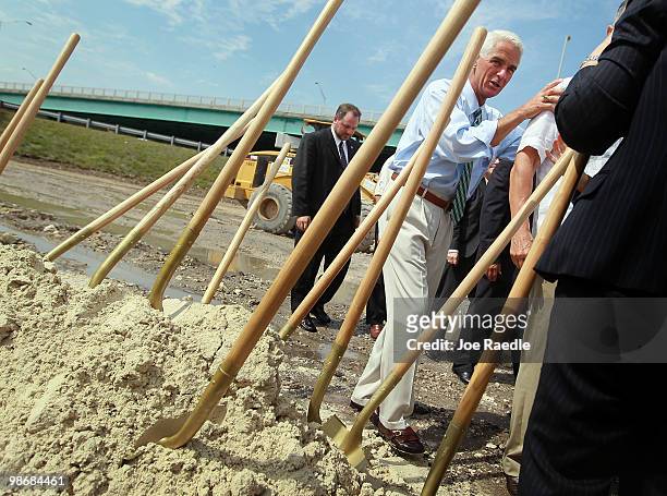 Florida Governor Charlie Crist walks past shovels as he attends the 826/836 Interchange Project Dedication Ceremony on April 26, 2010 in Miami,...