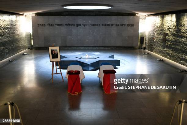 The coffins of women's rights icon, French politician and Holocaust survivor Simone and her husband Antoine Veil are drapped in the French national...