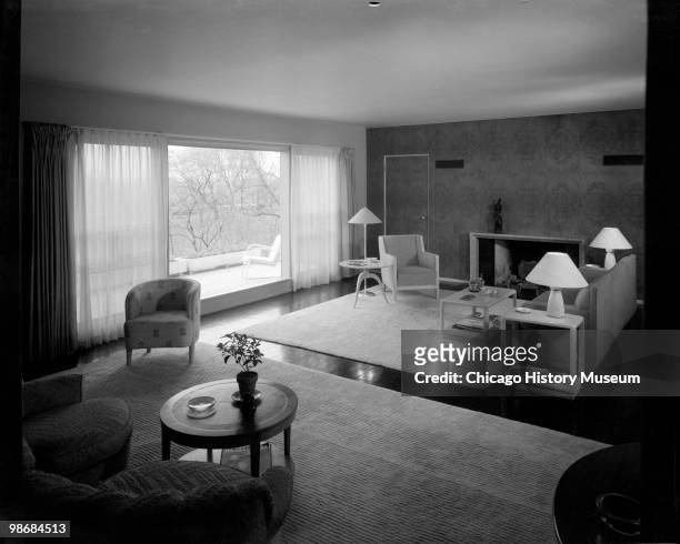Interior view of the living room in the James J. Schramm residence, located on a bluff over looking the river in Burlington, IA, 1940. Located at...