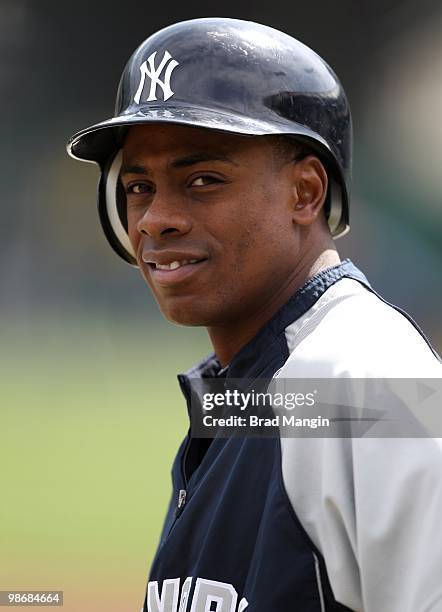 Curtis Granderson of the New York Yankees takes batting practice before the game between the New York Yankees and the Oakland Athletics on Thursday,...