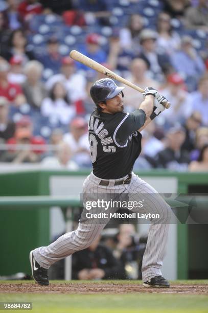 Ryan Spilborghs of the Colorado Rockies takes a swing during a baseball game against the Washington Nationals on April 22, 2010 at Nationals Park in...