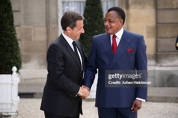 French President Nicolas Sarkozy welcomes Congolese President Denis Sassou N'Guesso at the Elysee Palace in Paris on April 26, 2010. Among other...