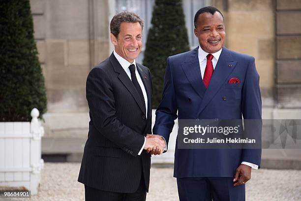 French President Nicolas Sarkozy welcomes Congolese President Denis Sassou N'Guesso at the Elysee Palace in Paris on April 26, 2010. Among other...