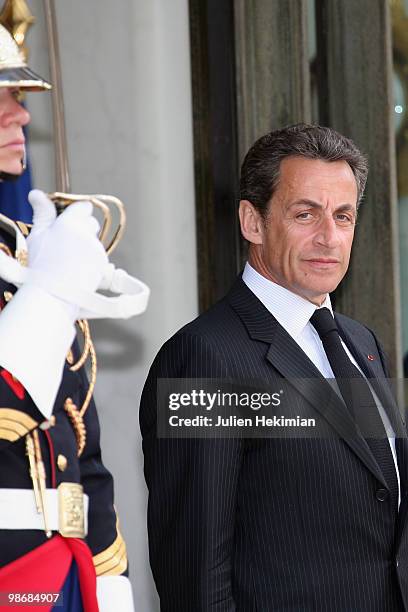 French President Nicolas Sarkozy waits for the arrival of Congolese President Denis Sassou N'Guesso at the Elysee Palace in Paris on April 26, 2010...
