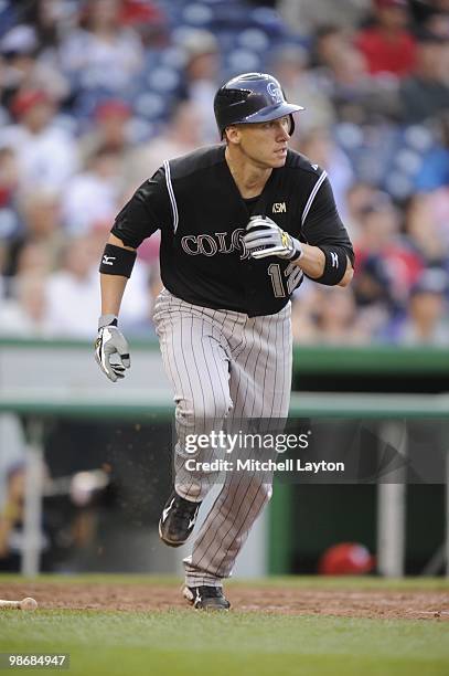 Clint Barmes of the Colorado Rockies runs to first base during a baseball game against the Washington Nationals on April 22, 2010 at Nationals Park...