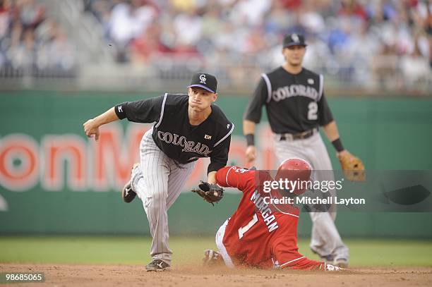 Troy Tulowitzki of the Colorado Rockies tags out Nyjer Morgan of the Washington Nationals during a baseball game April 22, 2010 at Nationals Park in...