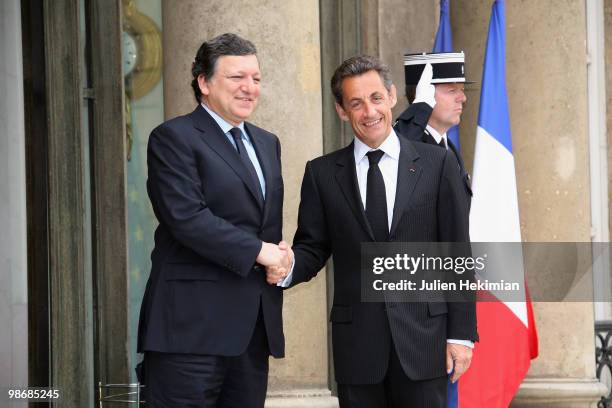 French President Nicolas Sarkozy welcomes European Commission President Jose Manuel Barroso prior to a working lunch on April 26, 2010 at the Elysee...