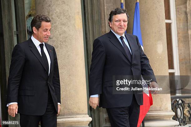 French President Nicolas Sarkozy escorts European Commission President Jose Manuel Barroso after a working lunch on April 26, 2010 at the Elysee...