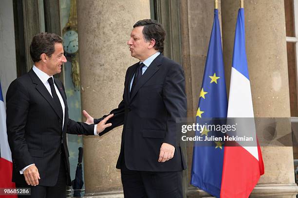 French President Nicolas Sarkozy escorts European Commission President Jose Manuel Barroso after a working lunch on April 26, 2010 at the Elysee...