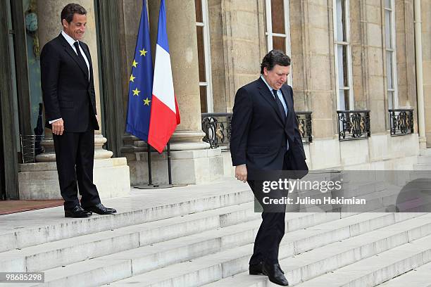 French President Nicolas Sarkozy escorts European Commission President Jose Manuel Barroso after a working lunch on April 26, 2010 at the Elysee...