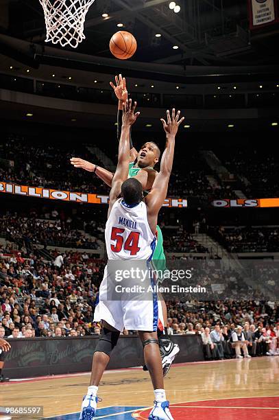 Glen Davis of the Boston Celtics shoots over Jason Maxiell of the Detroit Pistons during the game on March 2, 2010 at The Palace of Auburn Hills in...