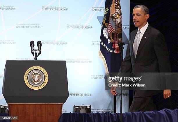 President Barack Obama walks up to speak on the opening day of the Presidential Summit on Entrepreneurship at the Ronald Reagan Building on April 26,...