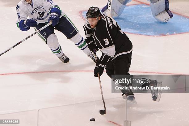 Jack Johnson of the Los Angeles Kings skates with the puck against the Vancouver Canucks in Game Six of the Western Conference Quarterfinals during...