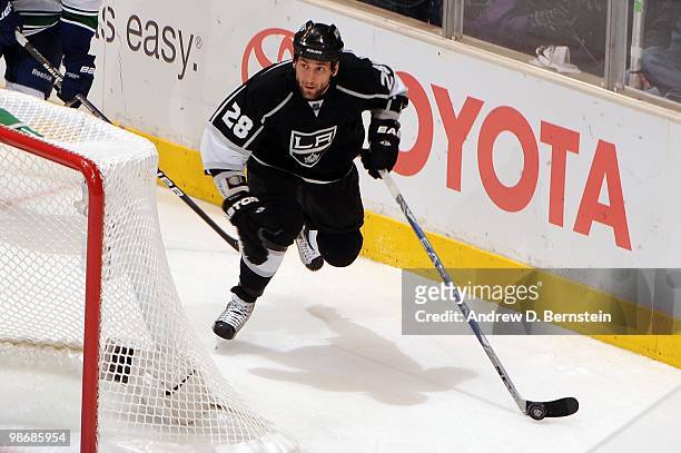 Jarret Stoll of the Los Angeles Kings skates with the puck against the Vancouver Canucks in Game Six of the Western Conference Quarterfinals during...
