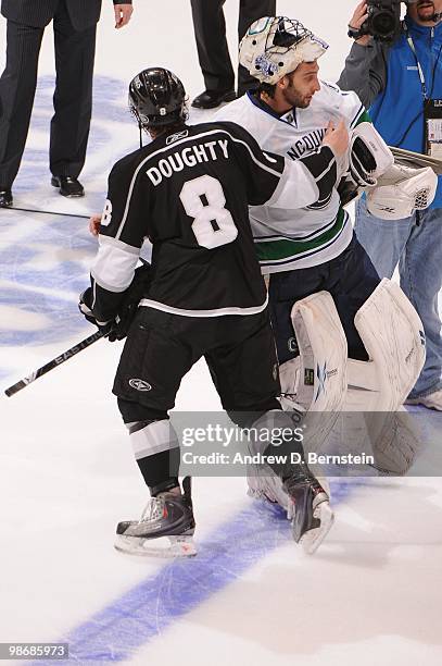 Drew Doughty of the Los Angeles Kings shakes hand with Roberto Luongo of the Vancouver Canucks after Game Six of the Western Conference Quarterfinals...