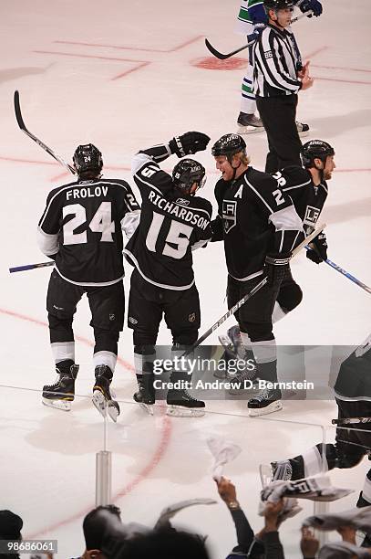 Alexander Frolov, Brad Richardson and Matt Greene of the Los Angeles Kings celebrate after a goal against the Vancouver Canucks in Game Six of the...