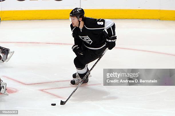 Drew Doughty of the Los Angeles Kings skates with the puck against the Vancouver Canucks in Game Six of the Western Conference Quarterfinals during...