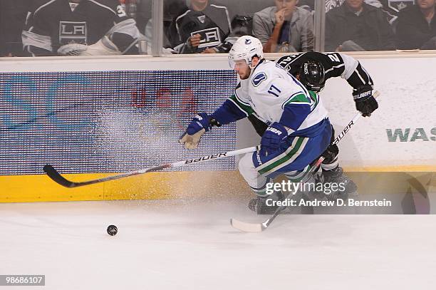 Ryan Kesler of the Vancouver Canucks skates with the puck against the Los Angeles Kings in Game Six of the Western Conference Quarterfinals during...