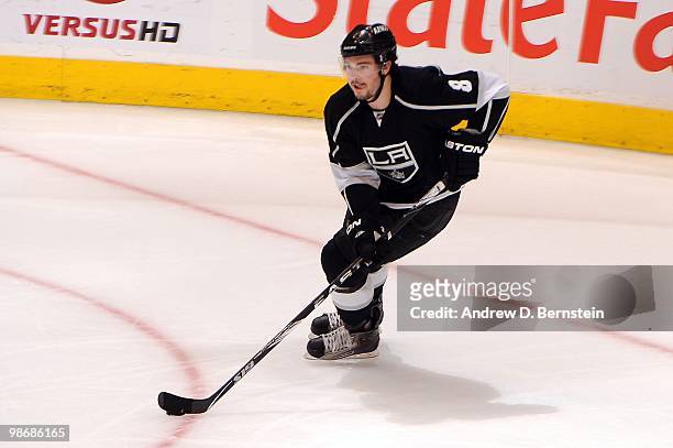 Drew Doughty of the Los Angeles Kings skates with the puck against the Vancouver Canucks in Game Six of the Western Conference Quarterfinals during...