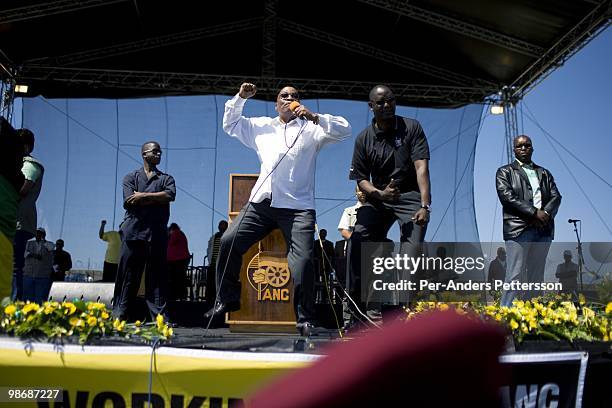 President Jacob Zuma sings and dances after a speech at a rally on February 22, 2009 in Khayelitsha a poor township outside Cape Town, South Africa....